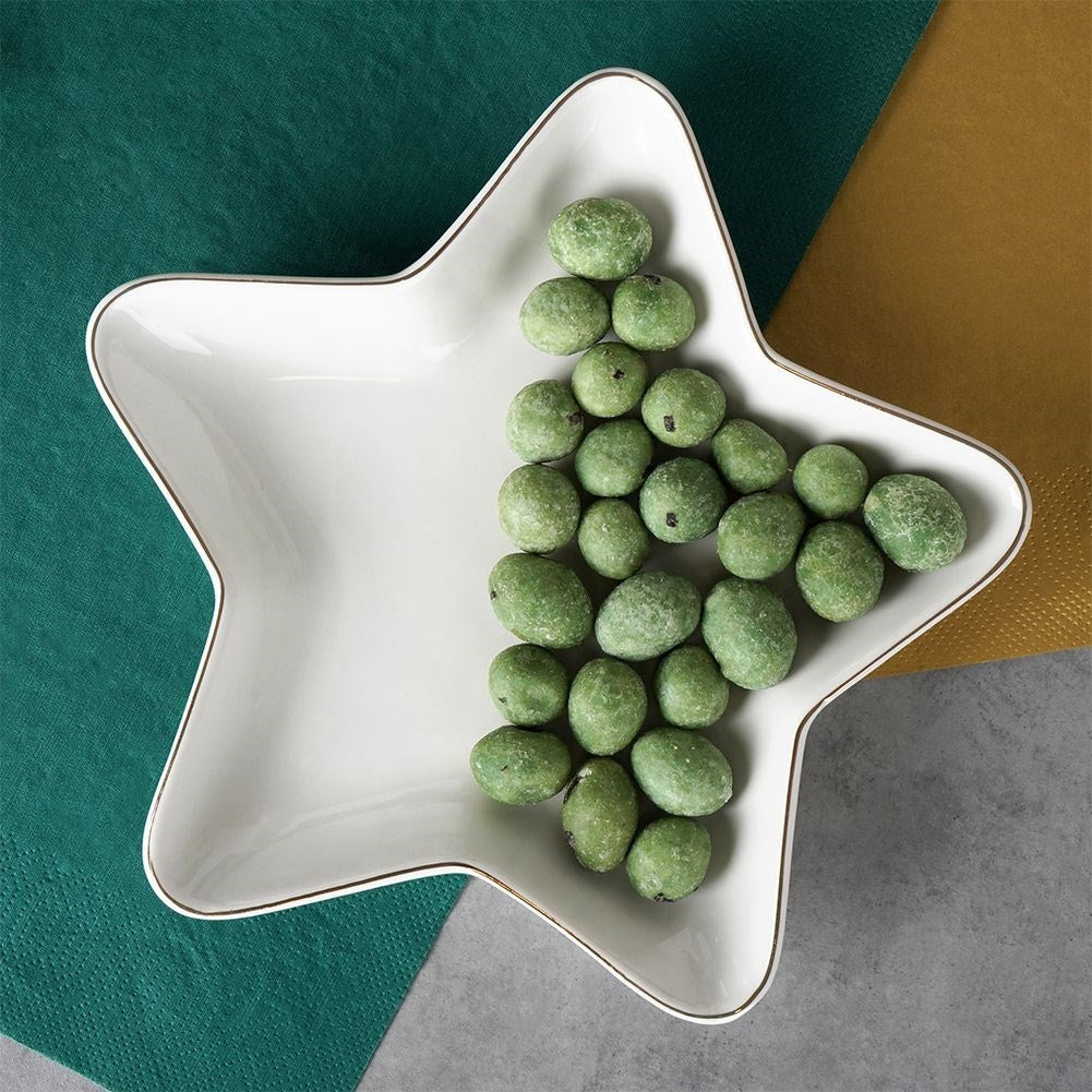 Star-shaped porcelain bowl with gold details for Christmas