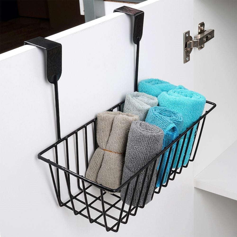 Storage basket for cabinet doors and shower cubicles