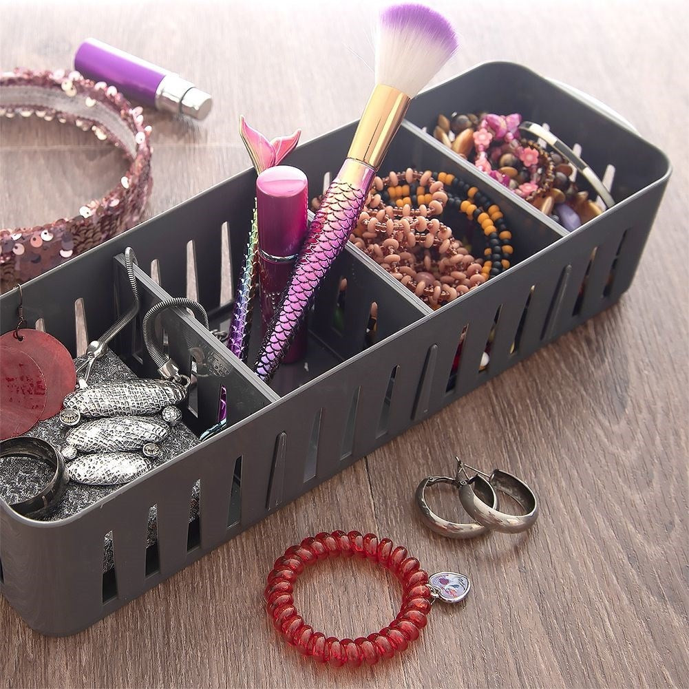 Storage container for spice bags in gray plastic
