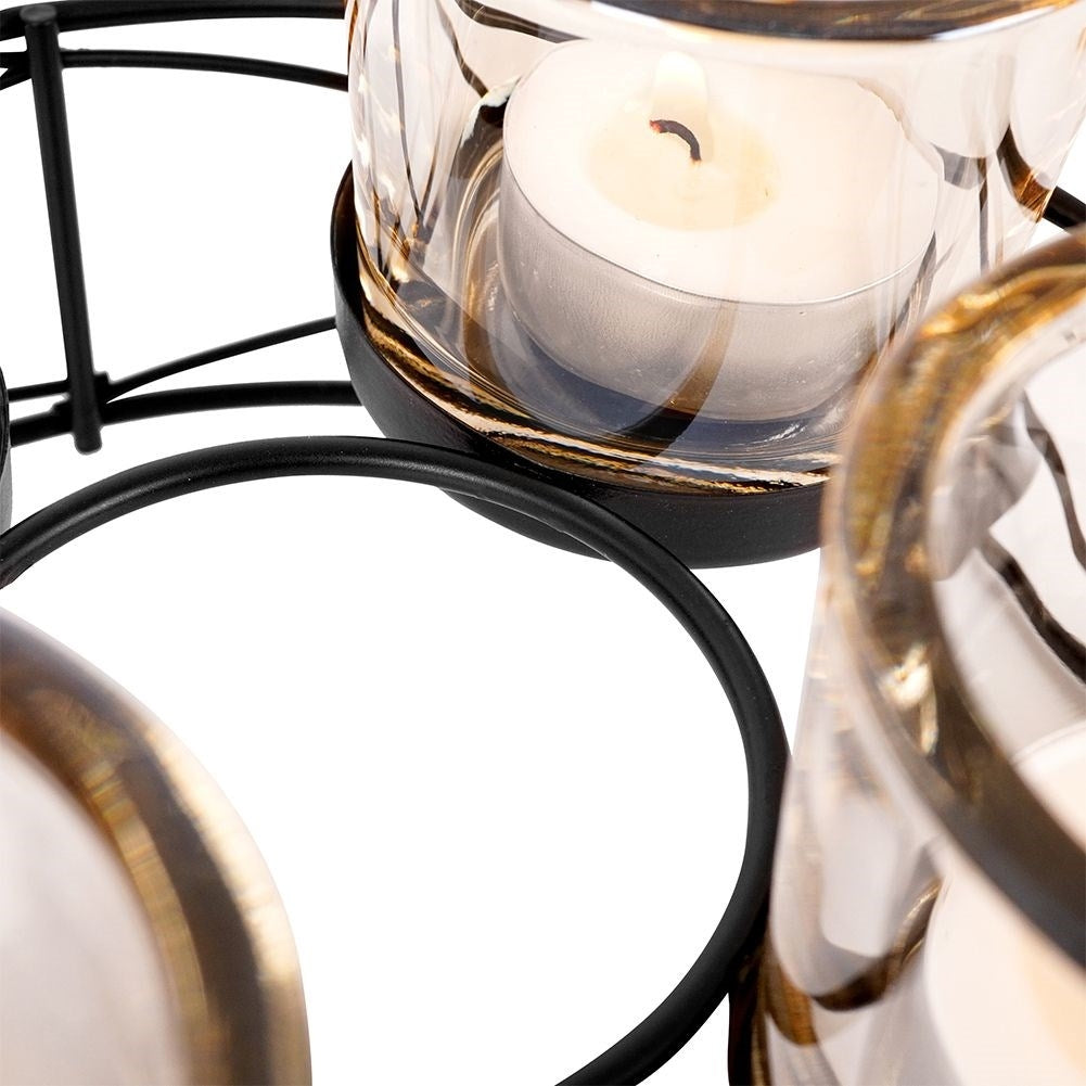 Stylish black candlestick for four tealights with glass insert