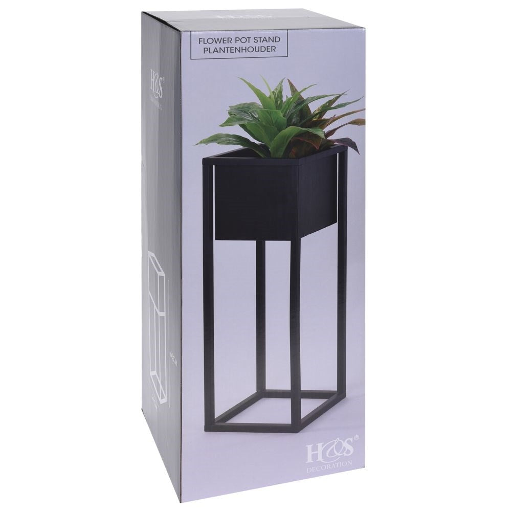 Stylish black metal flower pot on a stand