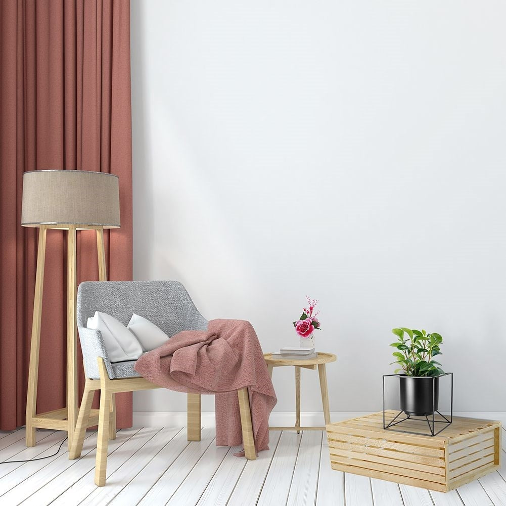 Stylish black metal pot for live and artificial plants