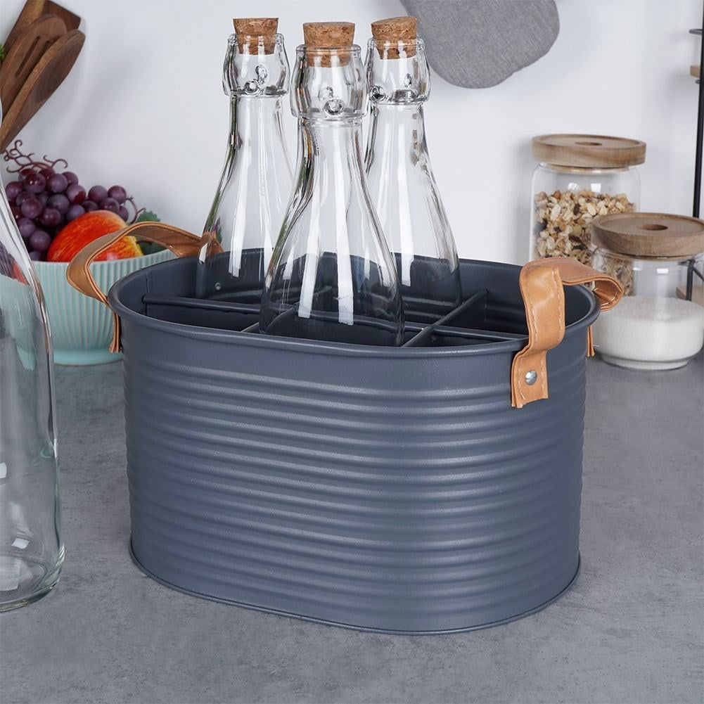 Stylish bottle storage in metal with leather handle, holds 6 bottles