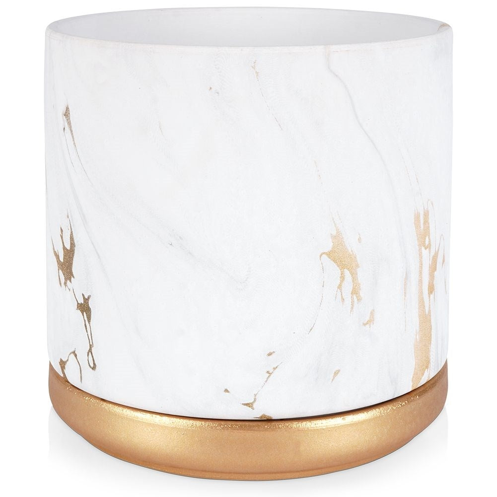 Stylish flower pot in a marble look with golden details