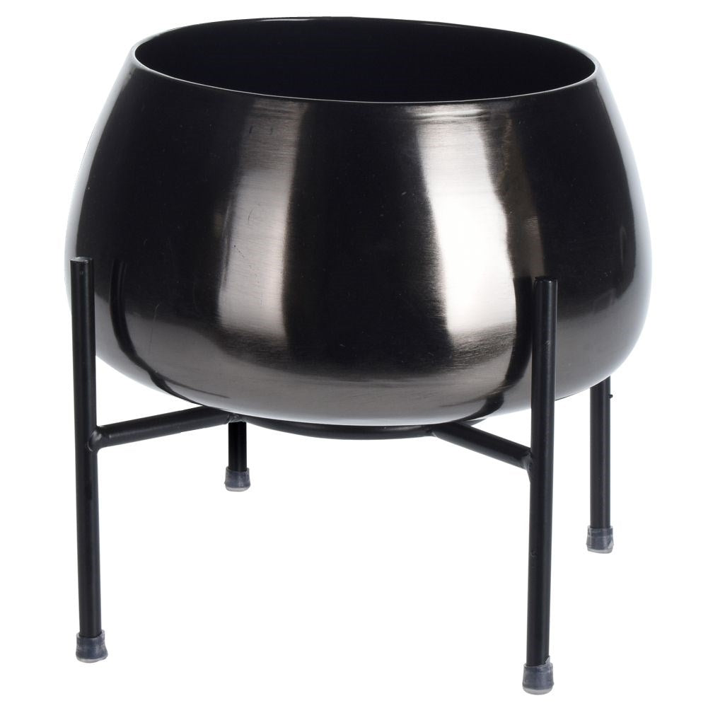 Stylish graphite colored metal pot on legs for plants