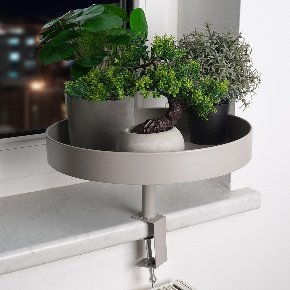Stylish gray flower holder for windowsill and table