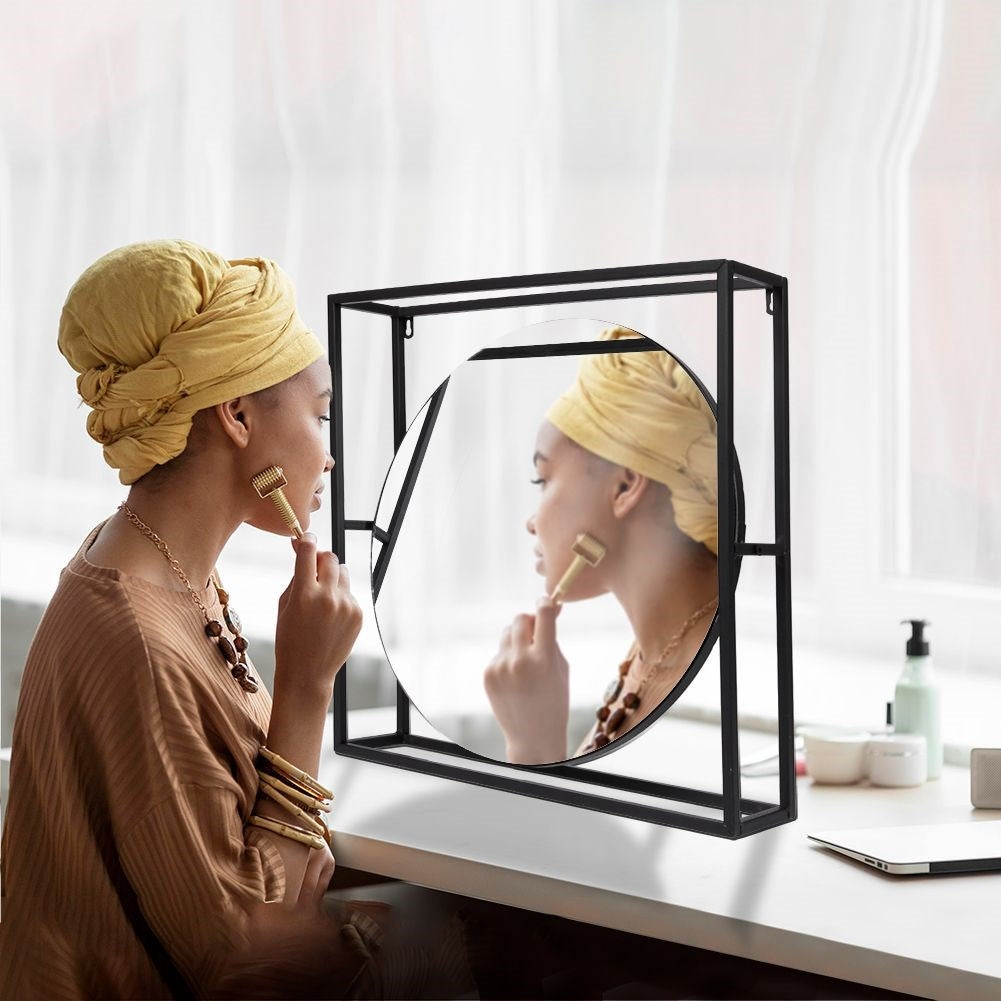 Stylish mirror with 3D effect and black metal frame
