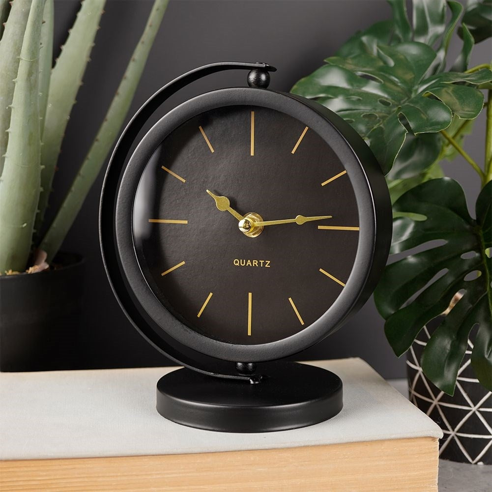 Stylish table clock in black metal for dresser or desk