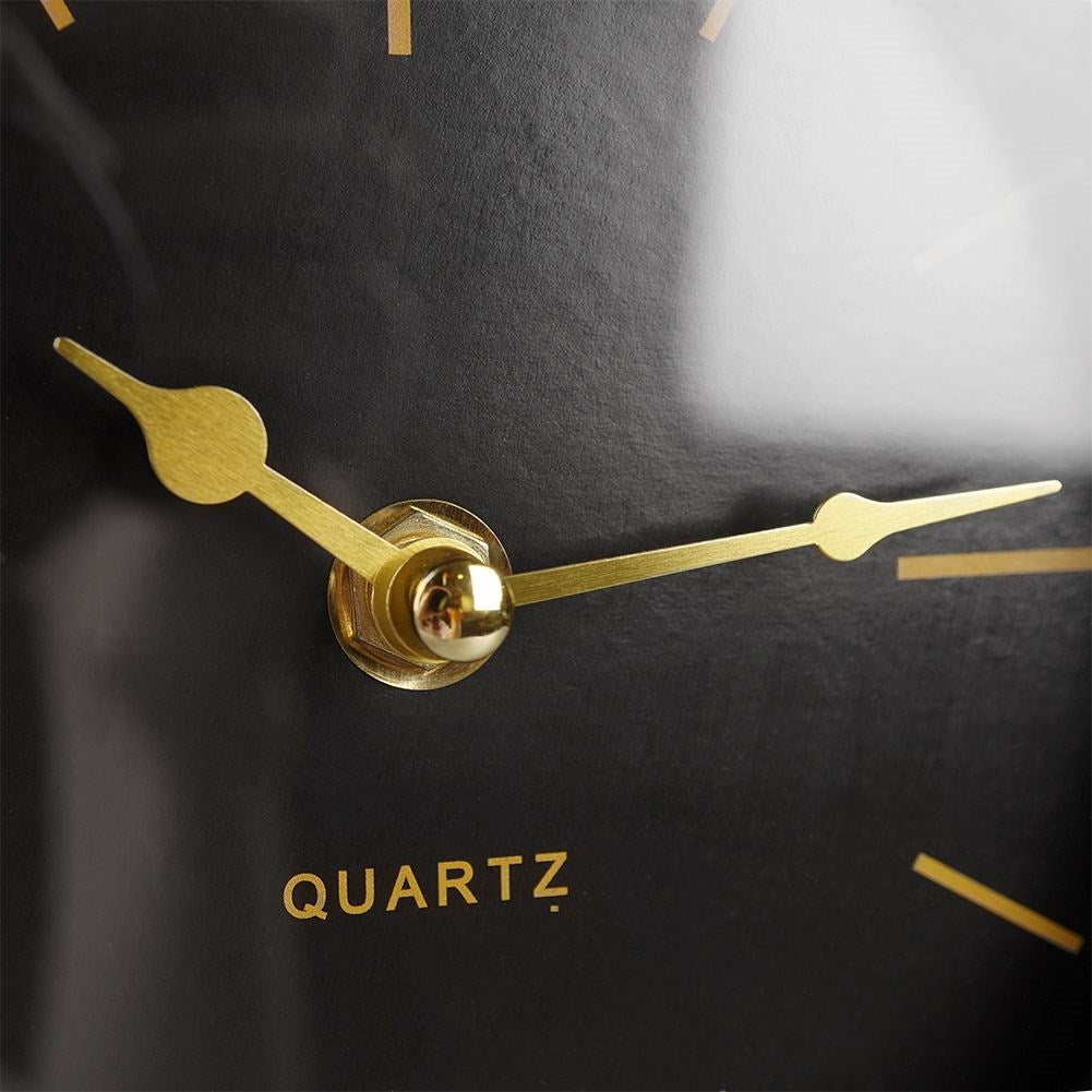 Stylish table clock in black metal for dresser or desk