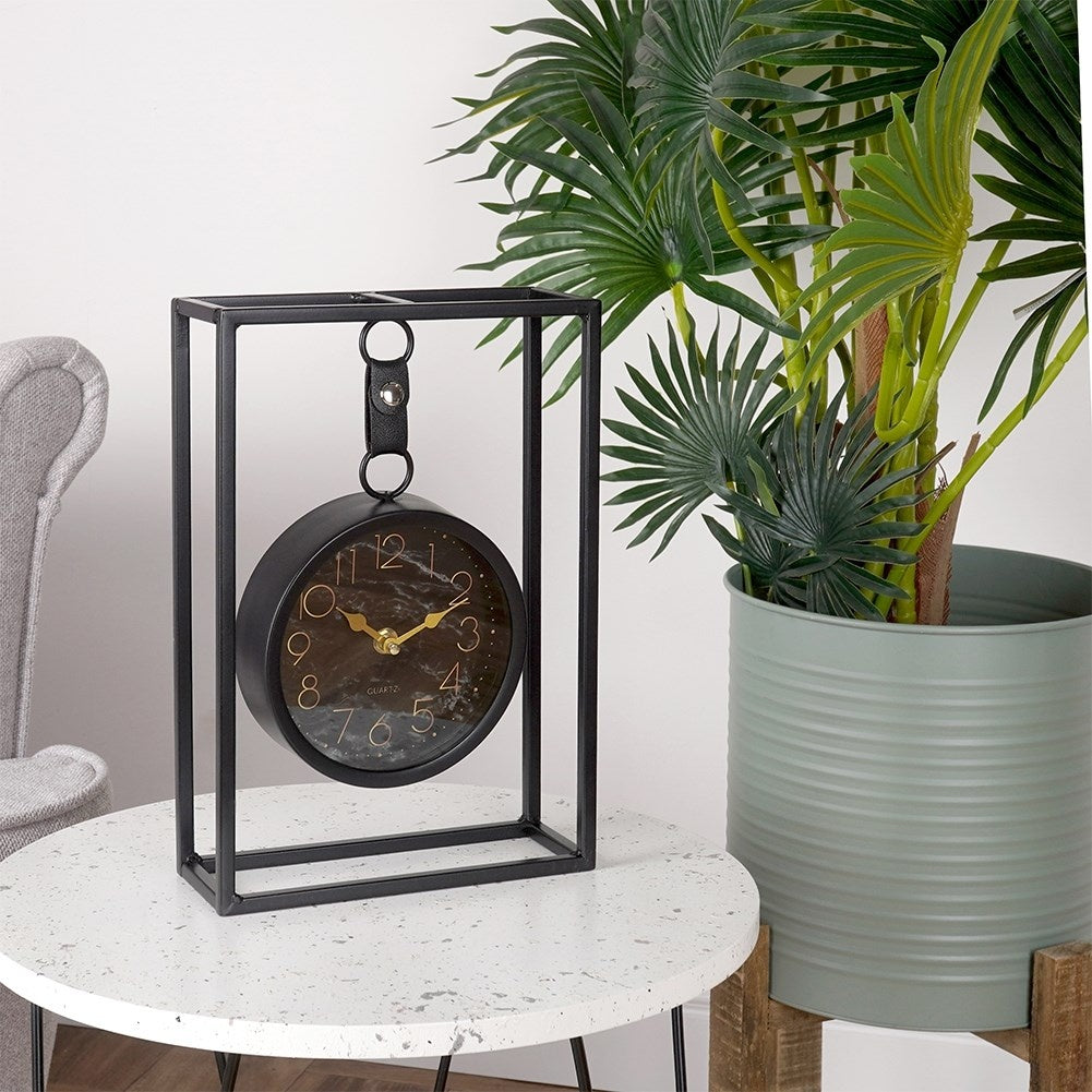 Stylish table clock with black marbled dial and metal frame
