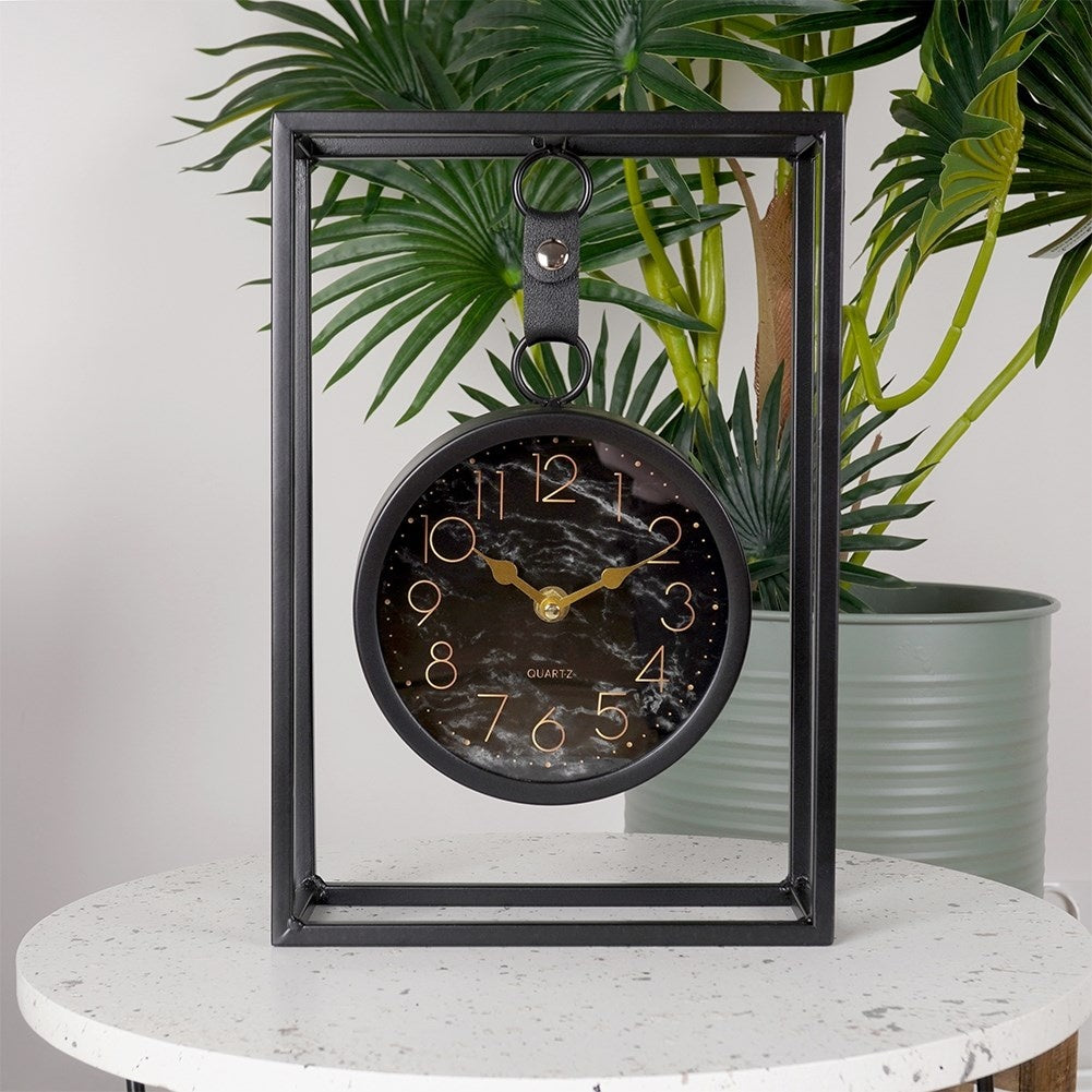 Stylish table clock with black marbled dial and metal frame