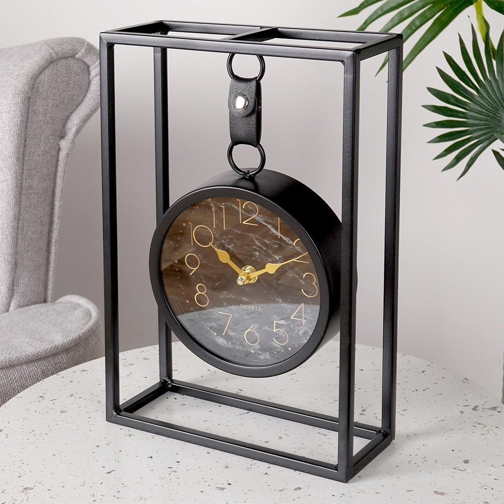 Stylish table clock with black marbled dial and metal frame