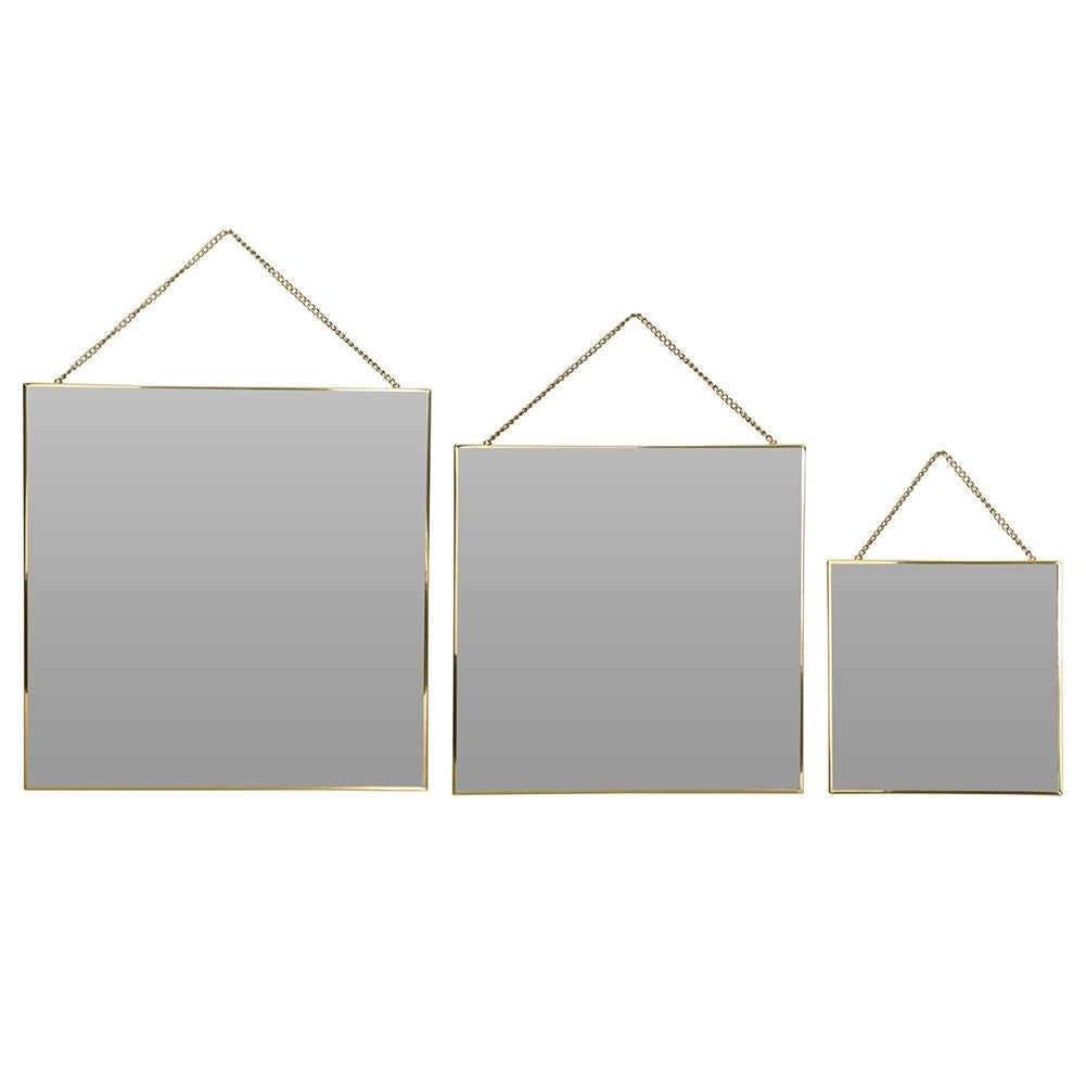 Stylish wall mirrors with golden metal frame and chain suspension