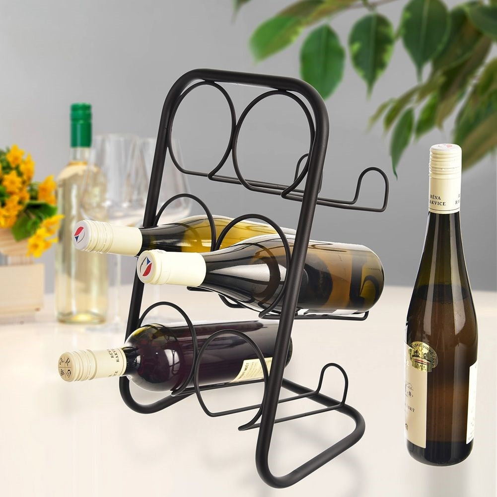 Stylish wine rack in black metal for 6 bottles