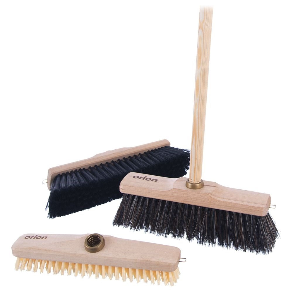 Sweeping brush with short, hard bristles for floors, tiles, concrete
