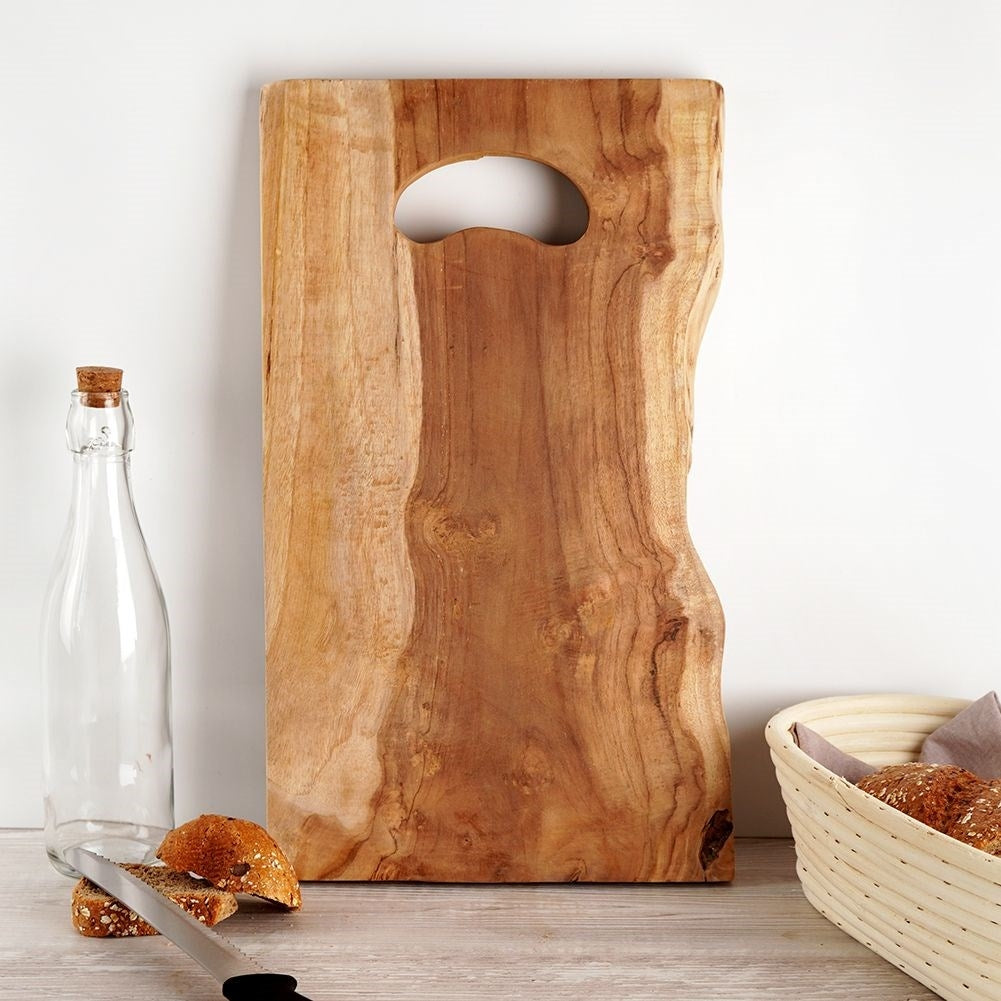 Teak wood cutting board with handle and antibacterial properties