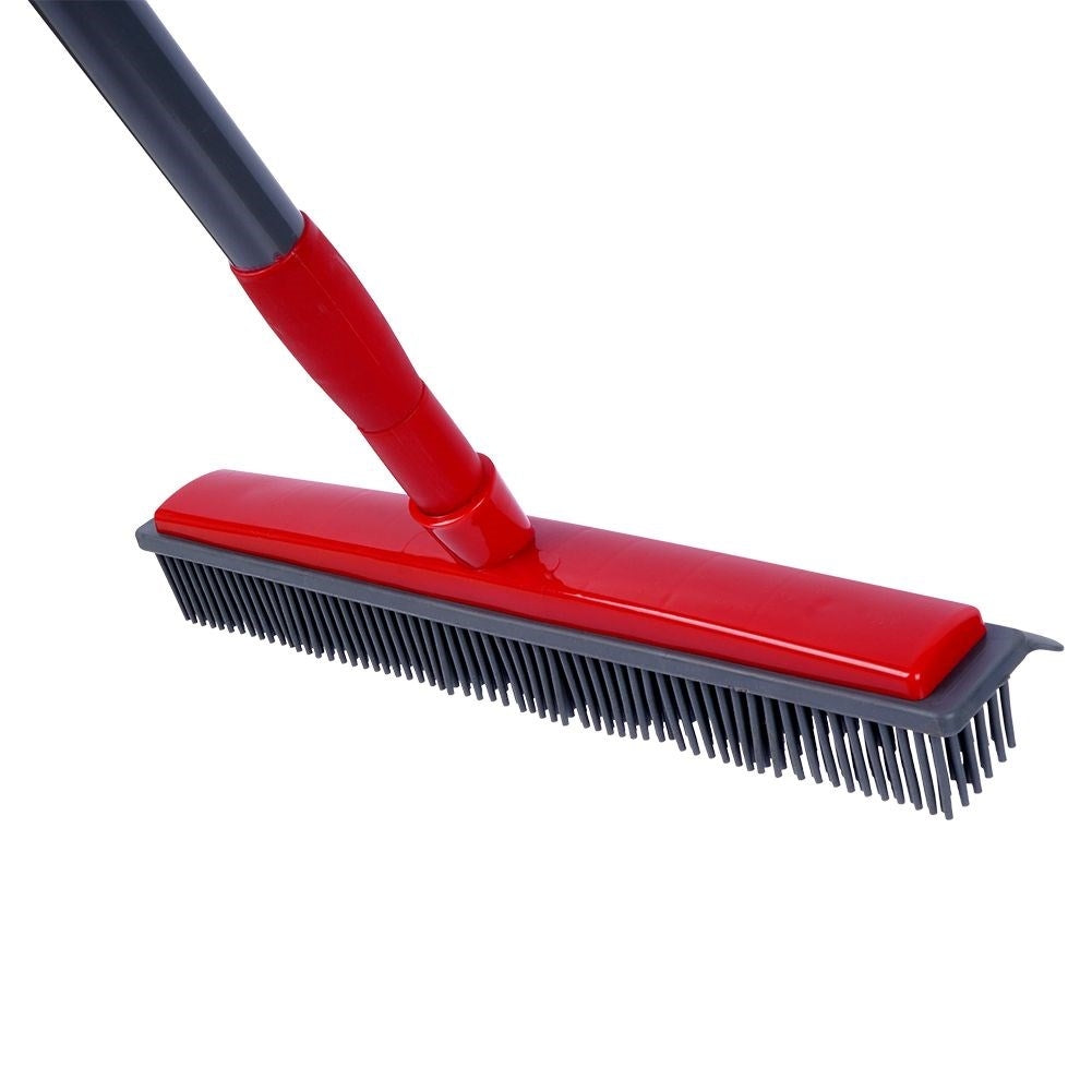 Telescopic broom with rubber brushes and water scraper