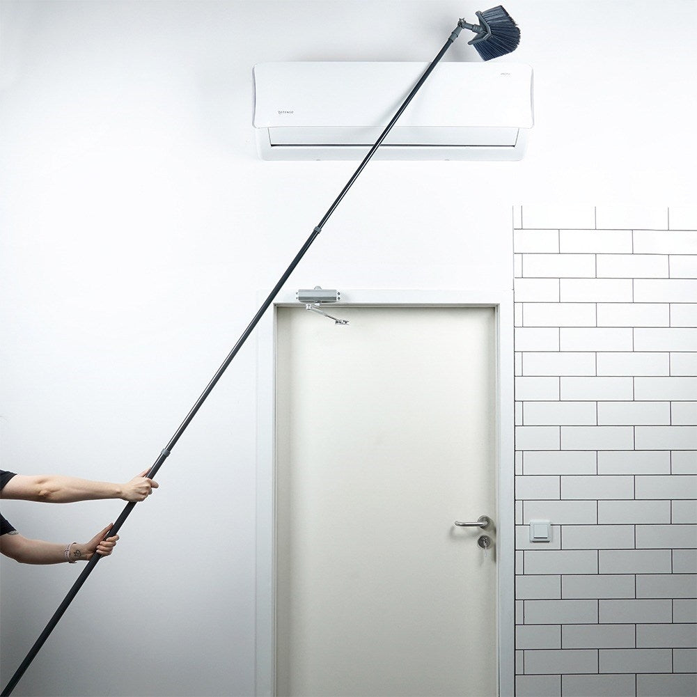 Telescopic sweeping brush with adjustable triangular brush