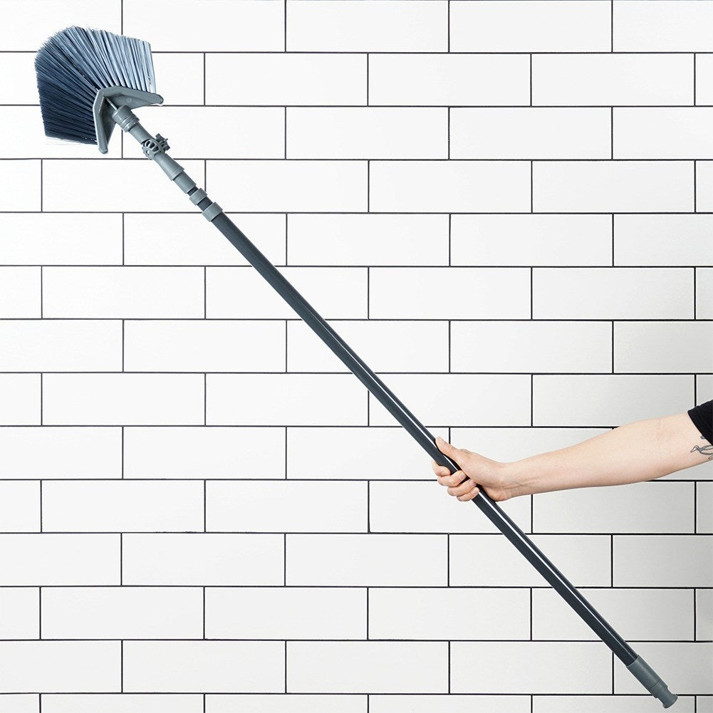 Telescopic sweeping brush with adjustable triangular brush
