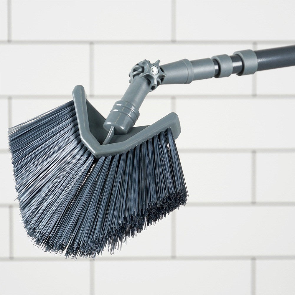 Telescopic sweeping brush with adjustable triangular brush