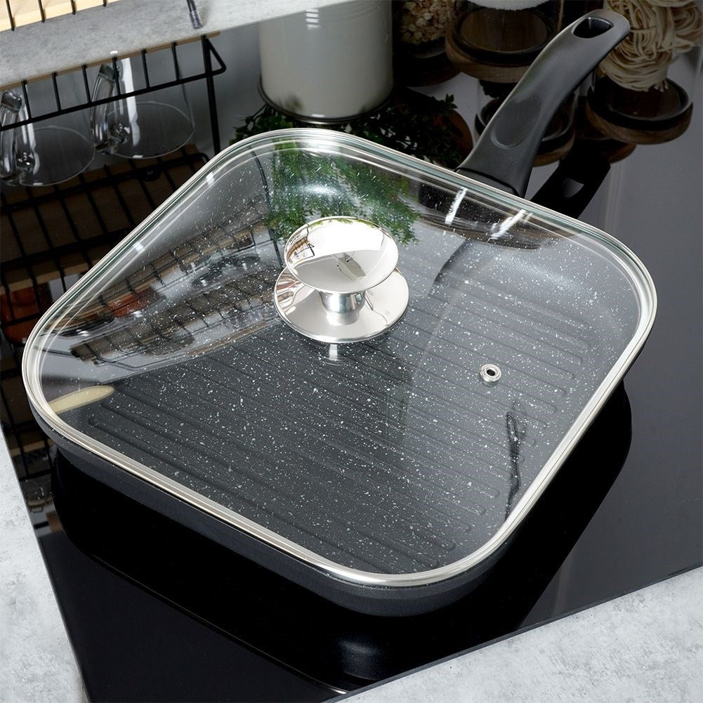 Temperature-resistant glass lid with steel knob and steam valve