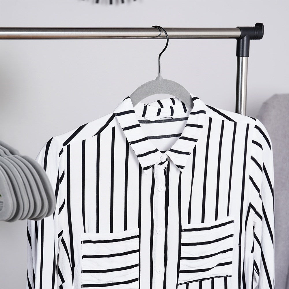Ten rotating clothes hangers in durable gray velvet fabric