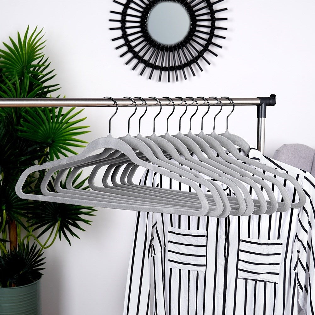 Ten rotating clothes hangers in durable gray velvet fabric