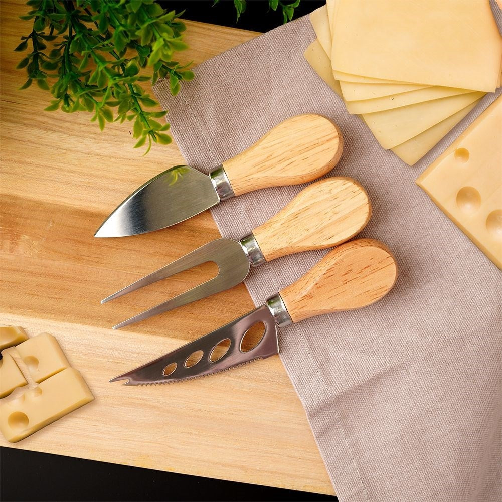 The cheese accessory set: 3 parts in stainless steel and rubber wood