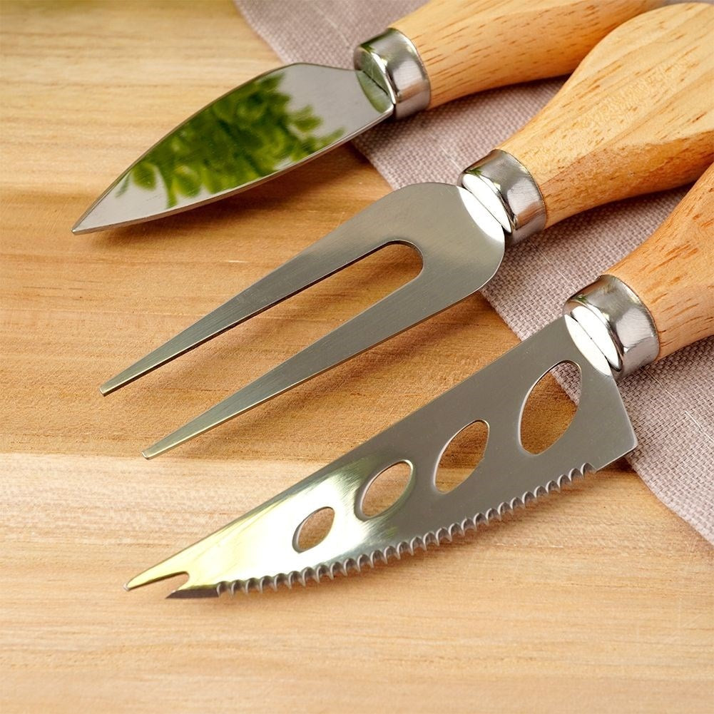 The cheese accessory set: 3 parts in stainless steel and rubber wood