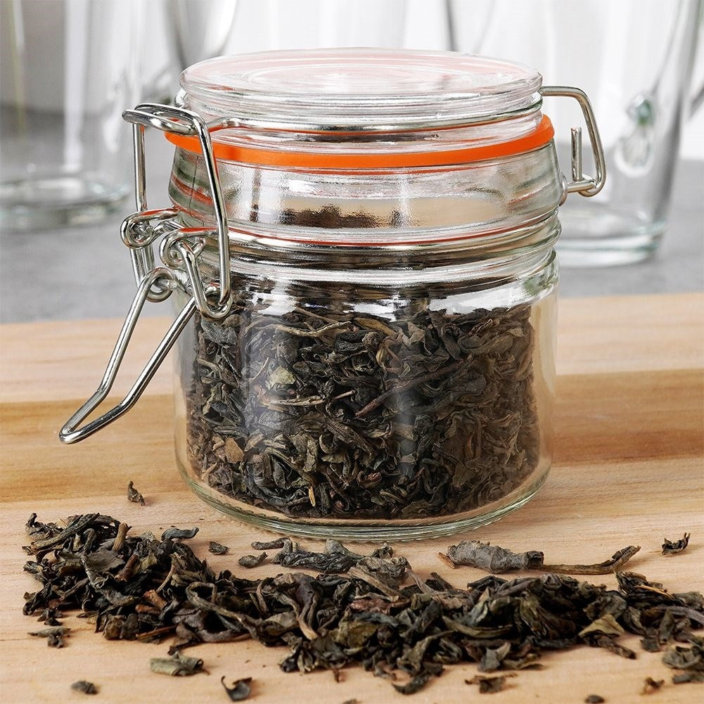 Thick glass jar with patent closure and rubber seal