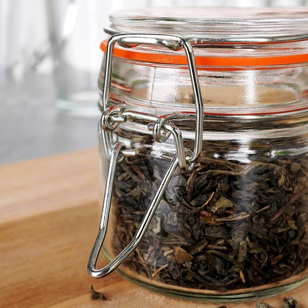 Thick glass jar with patent closure and rubber seal