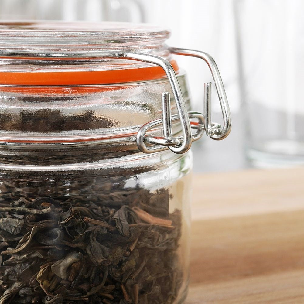 Thick glass jar with patent closure and rubber seal