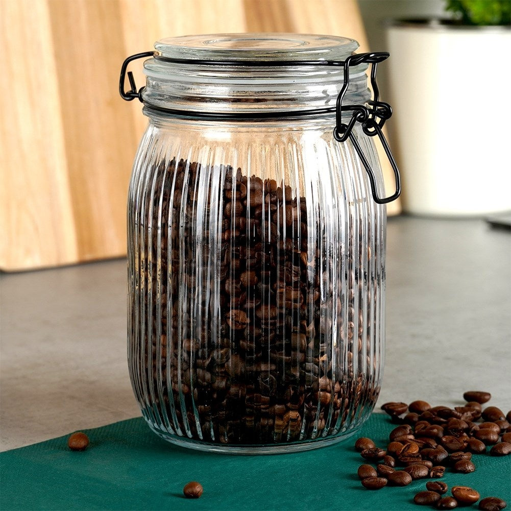 Thick glass jar with patent closure and rubber seal