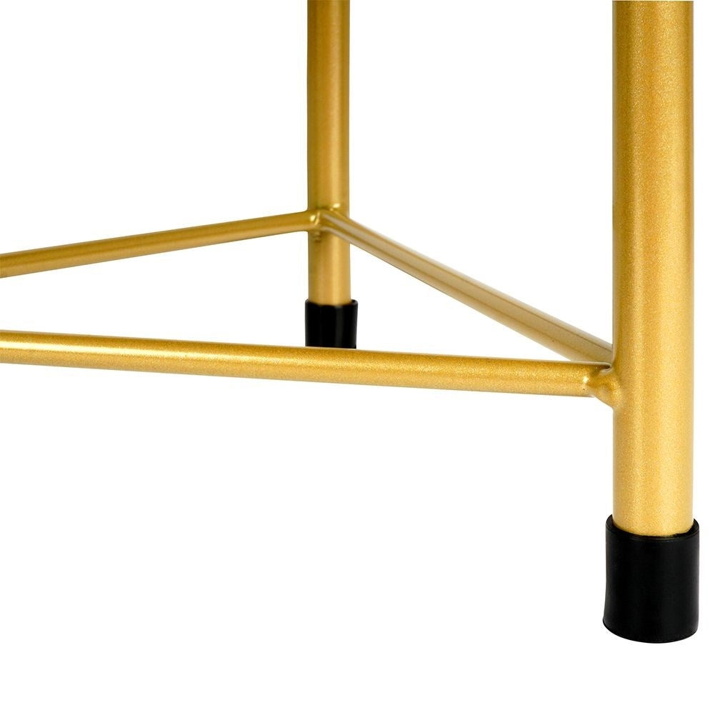 Three black flower pots on gold stand for elegant plant display