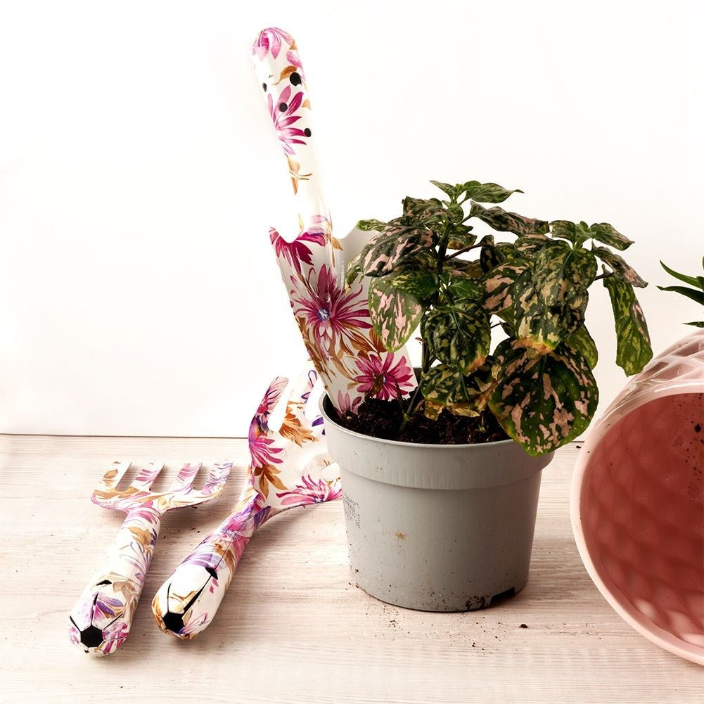 Three essential garden tools with floral patterns