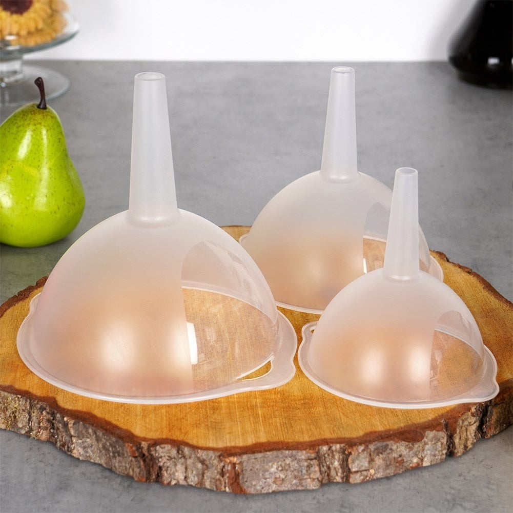 Three kitchen funnels in different sizes, transparent material