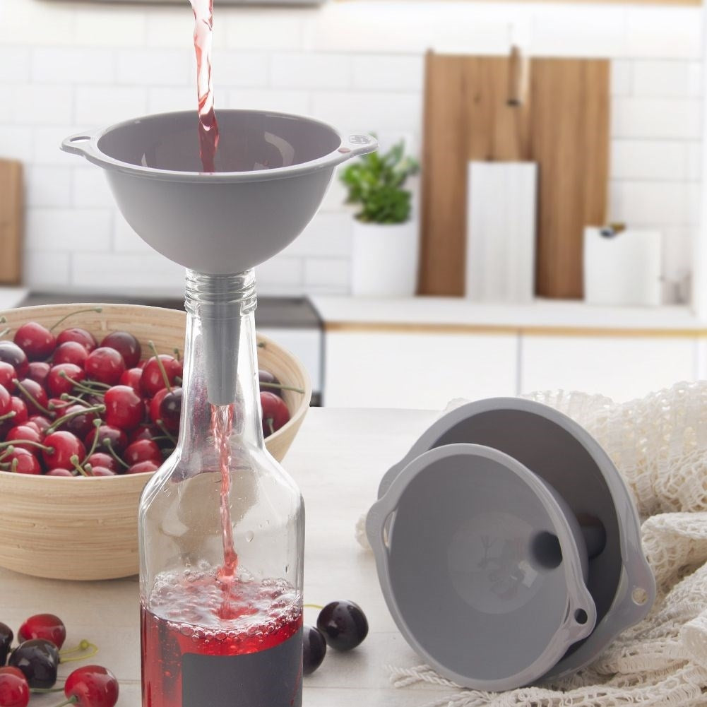 Three kitchen funnels in different sizes, transparent material