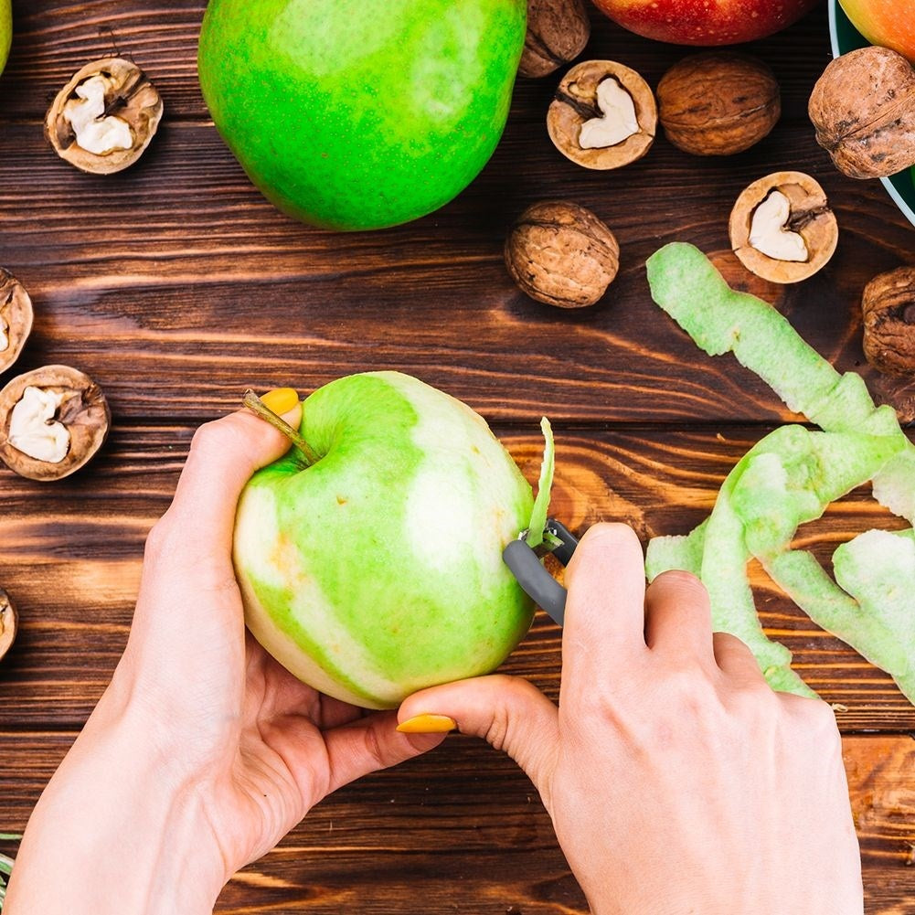 Three kitchen peelers with non-slip handles for easy peeling