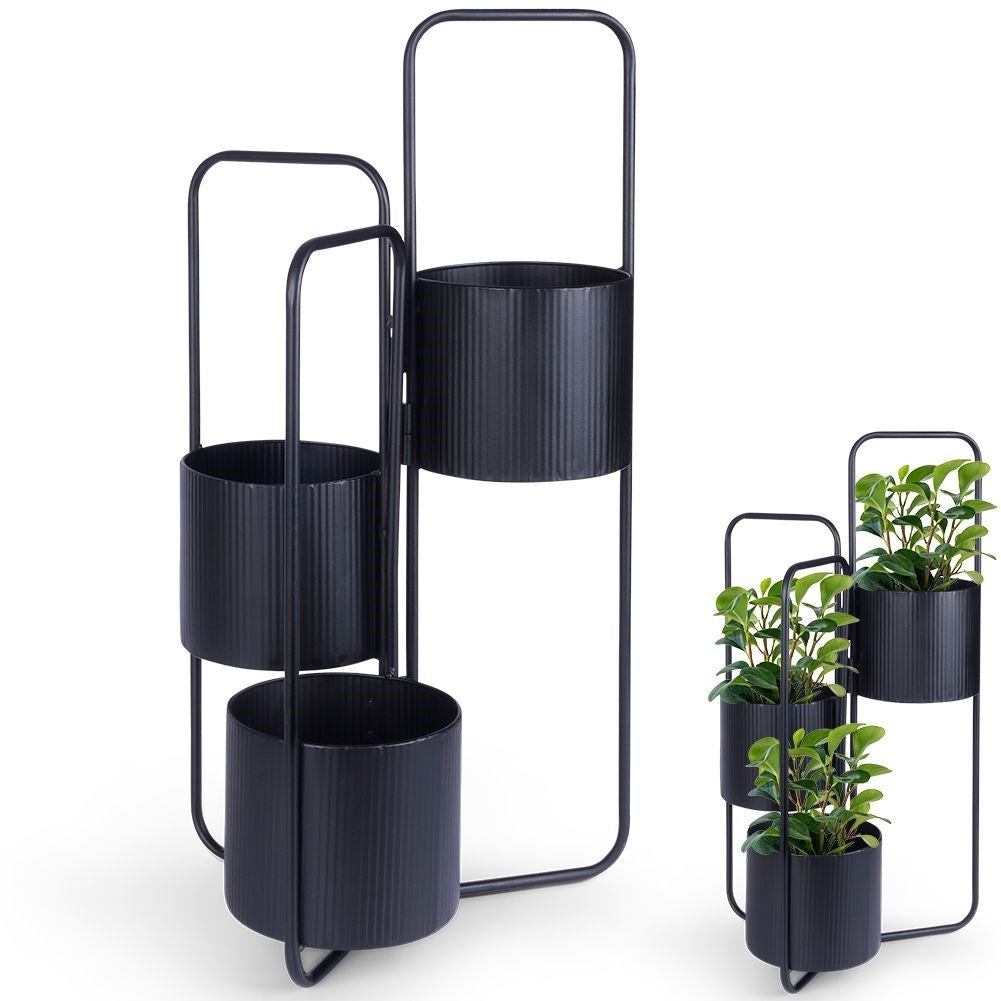 Three-legged flower stand in black metal for indoor use