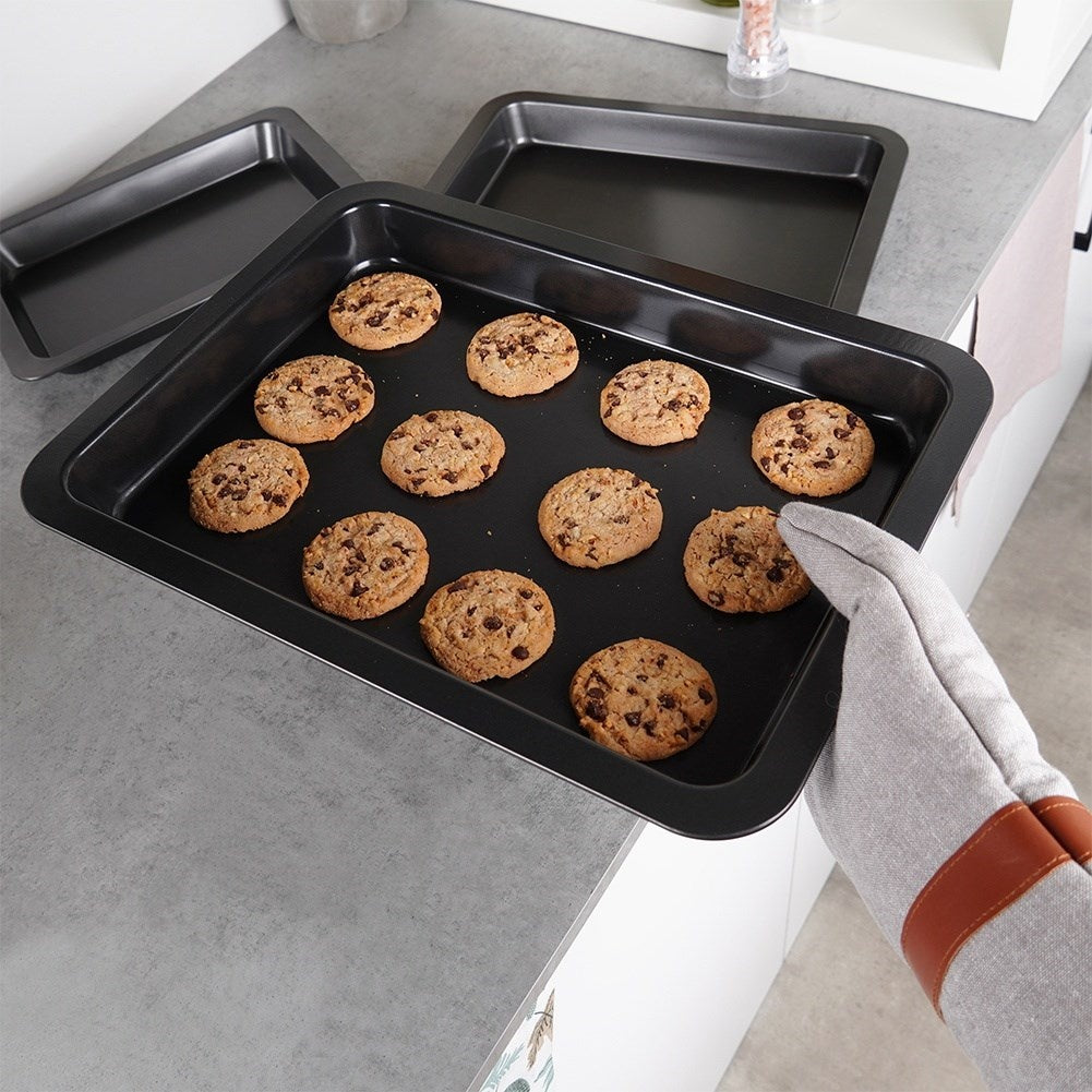 Three rectangular baking trays with non-stick coating