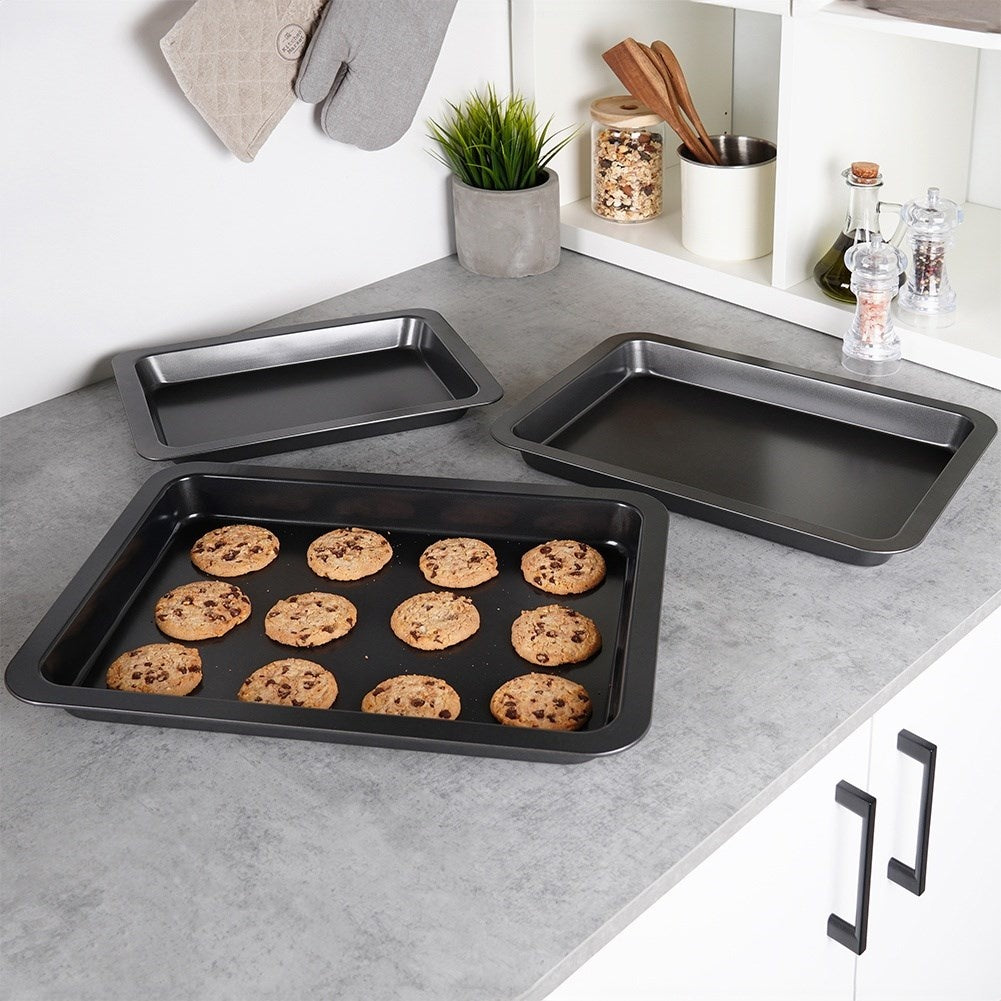 Three rectangular baking trays with non-stick coating