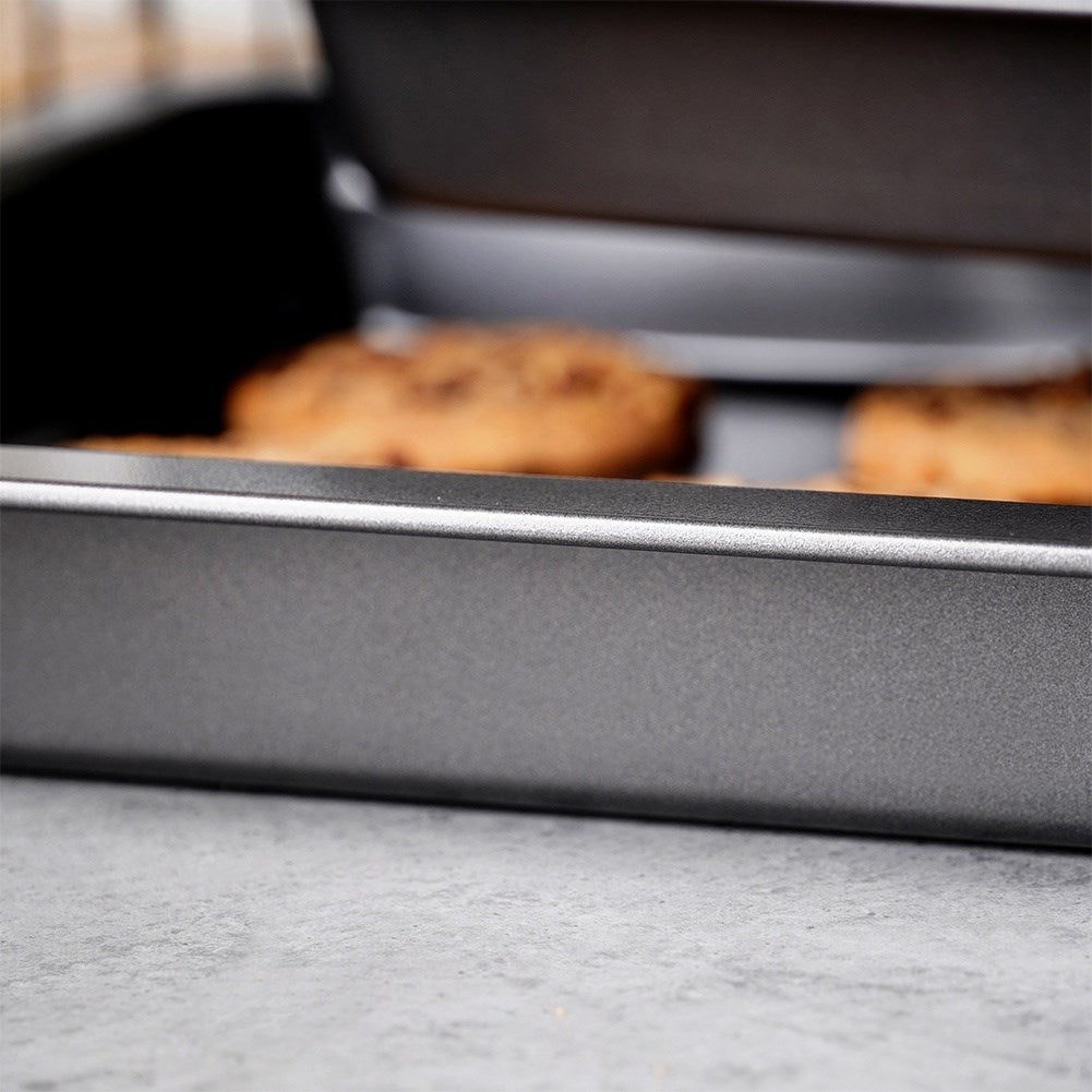 Three rectangular baking trays with non-stick coating
