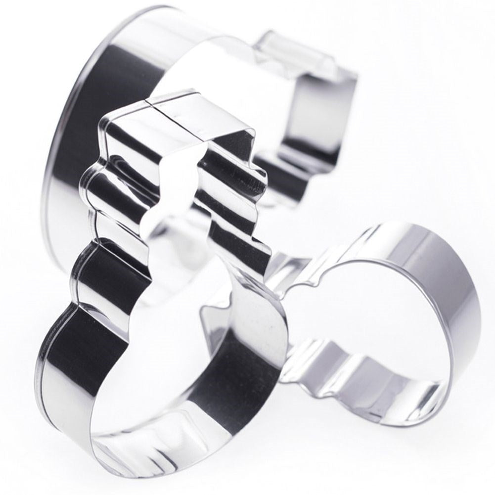 Three stainless steel snowman molds for Christmas baking