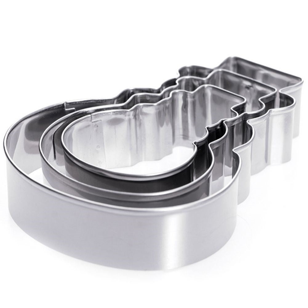 Three stainless steel snowman molds for Christmas baking