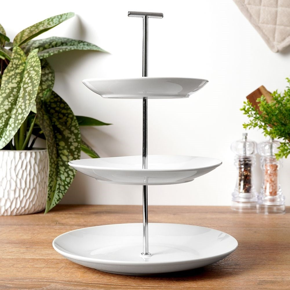 Tiered dishes for cakes, tarts, fruit and snacks in white porcelain