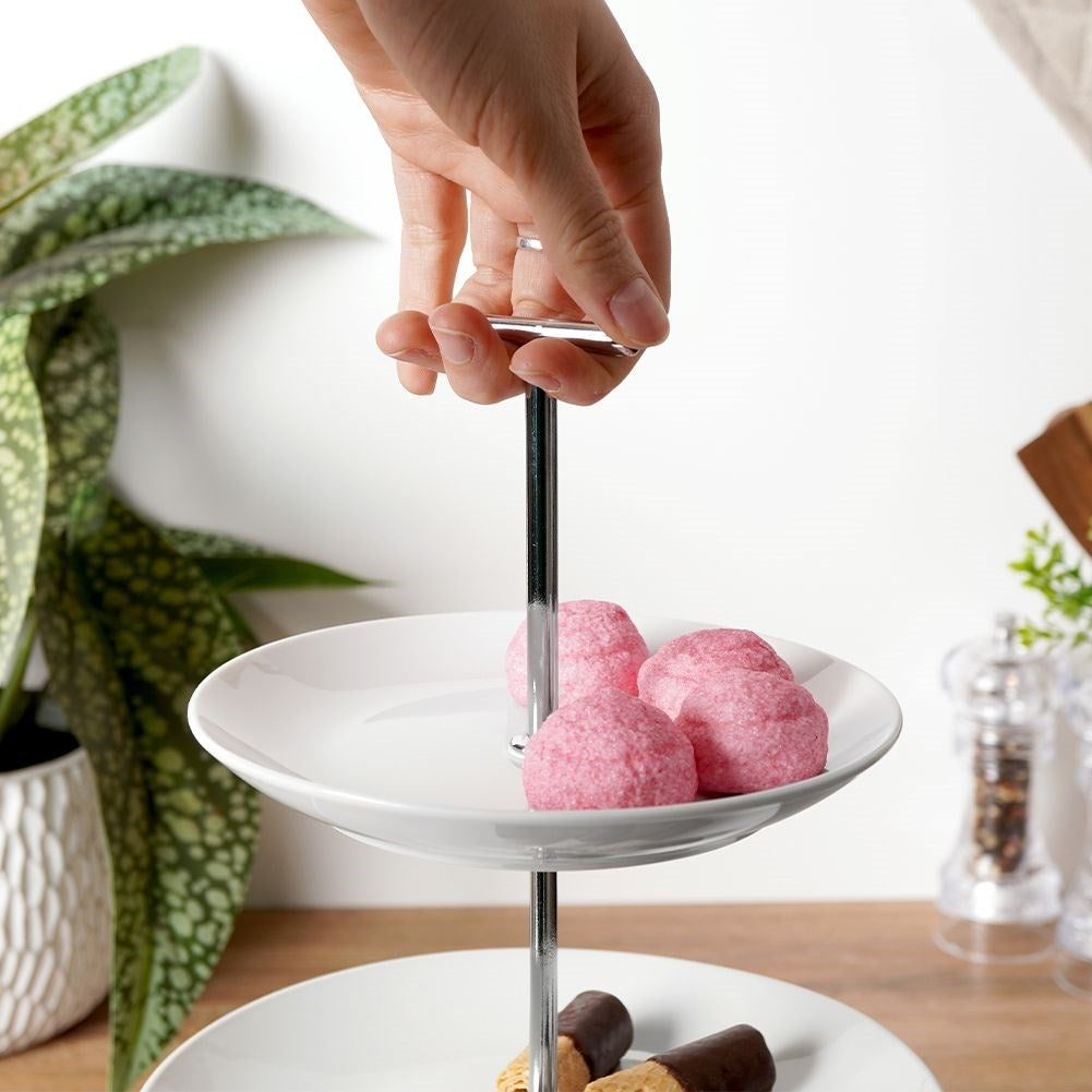 Tiered dishes for cakes, tarts, fruit and snacks in white porcelain