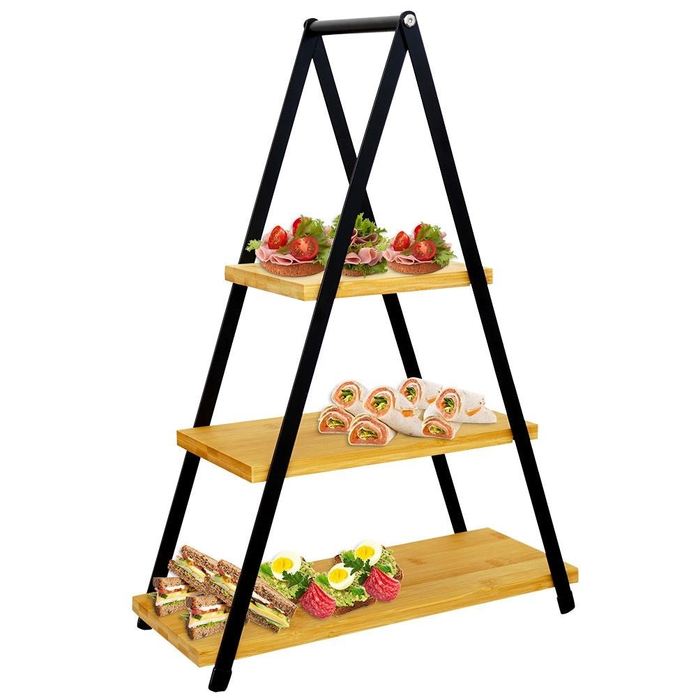 Tiered dishes with wooden trays for charcuterie, cheese, cakes and snacks