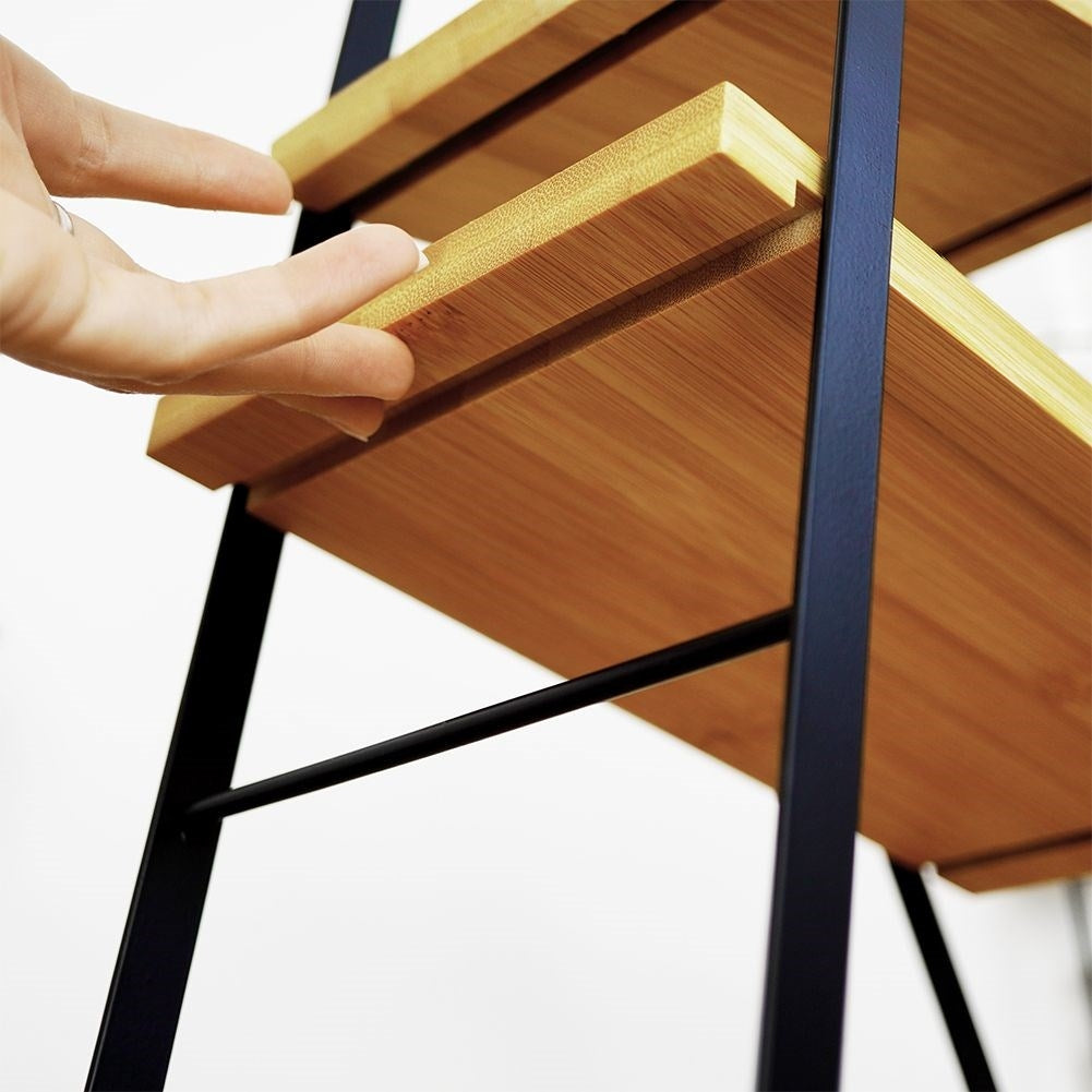Tiered dishes with wooden trays for charcuterie, cheese, cakes and snacks