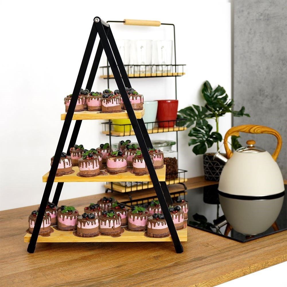 Tiered dishes with wooden trays for charcuterie, cheese, cakes and snacks