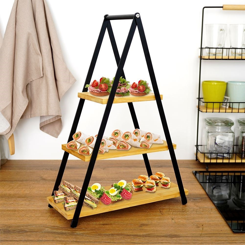 Tiered dishes with wooden trays for charcuterie, cheese, cakes and snacks